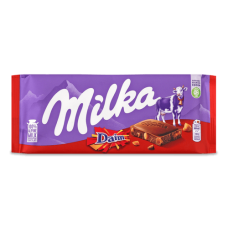 Шоколад молочний Milka зі шматочками карамелі з мигдалем  90 г.